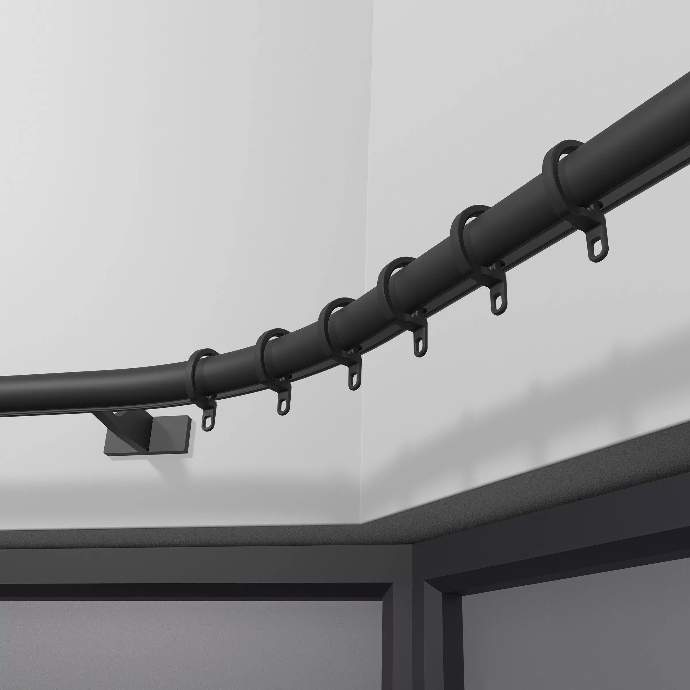 Black curtain rail going round the corner of a room