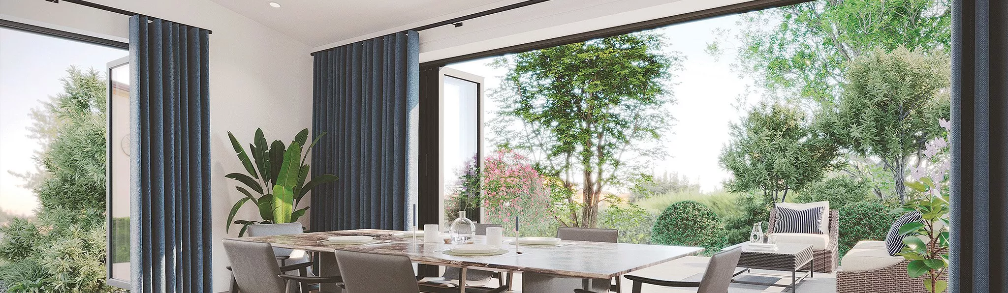Blue floor length curtains in dining room setting