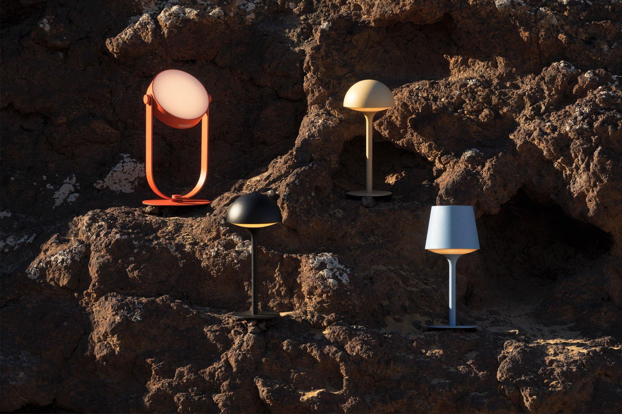 Image of several lamps sitting on rocks