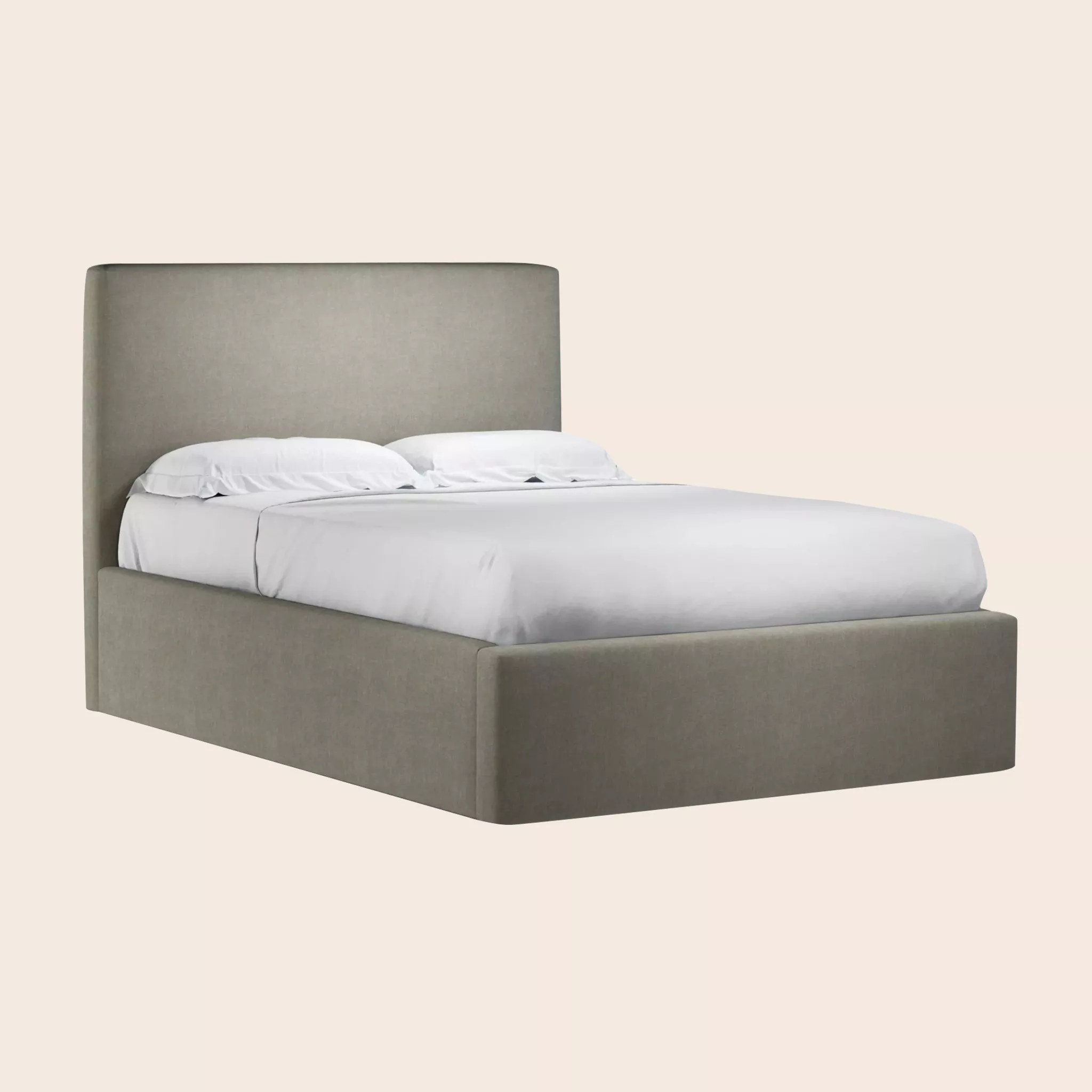 Elegant upholstered bed with a high headboard and crisp white bedding, set against a neutral background.