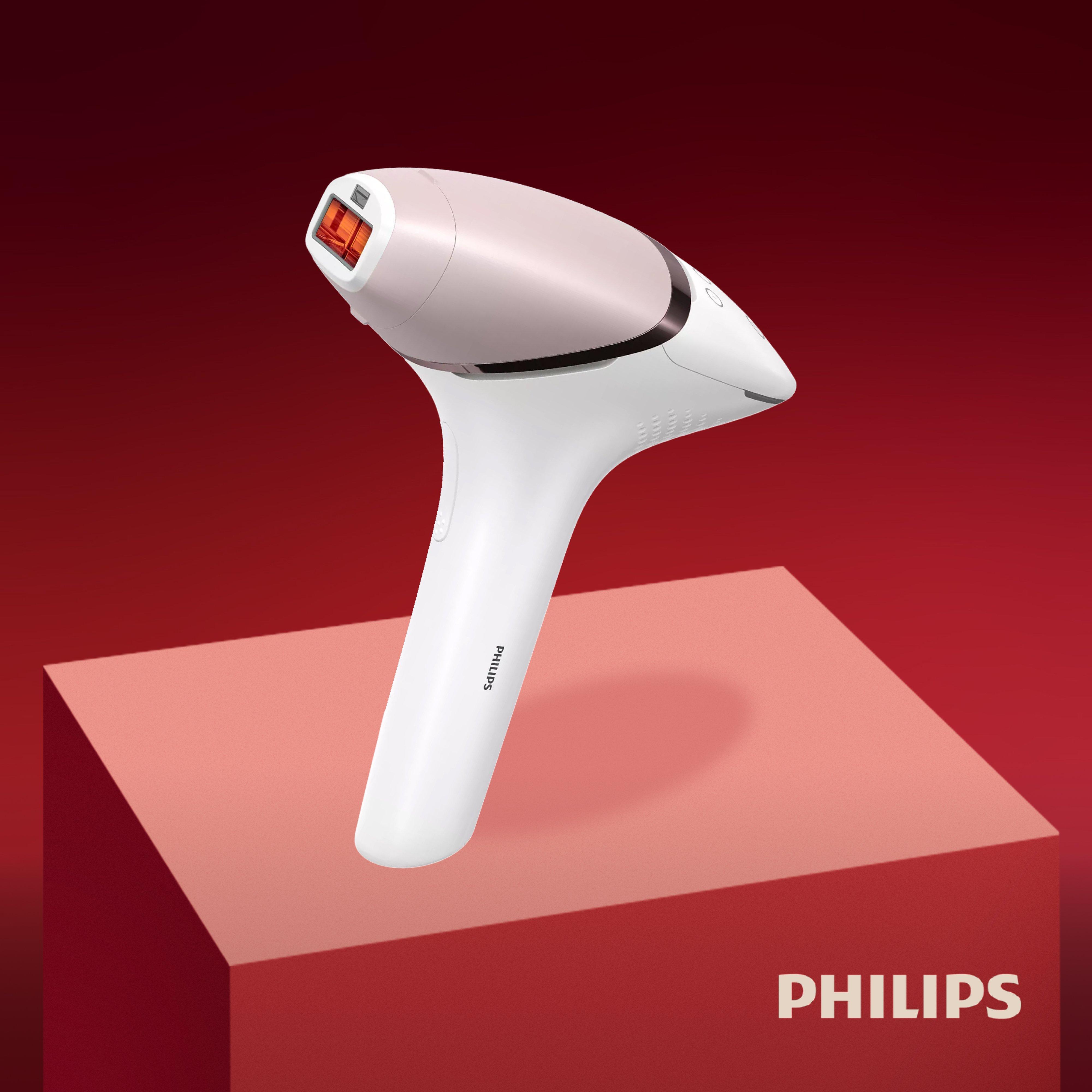 philips ipl machine on red backbround and plinth