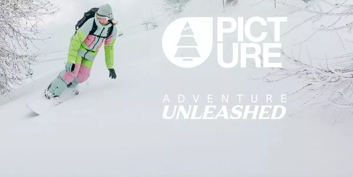 A brand banner showing women skiing in picture clothing.