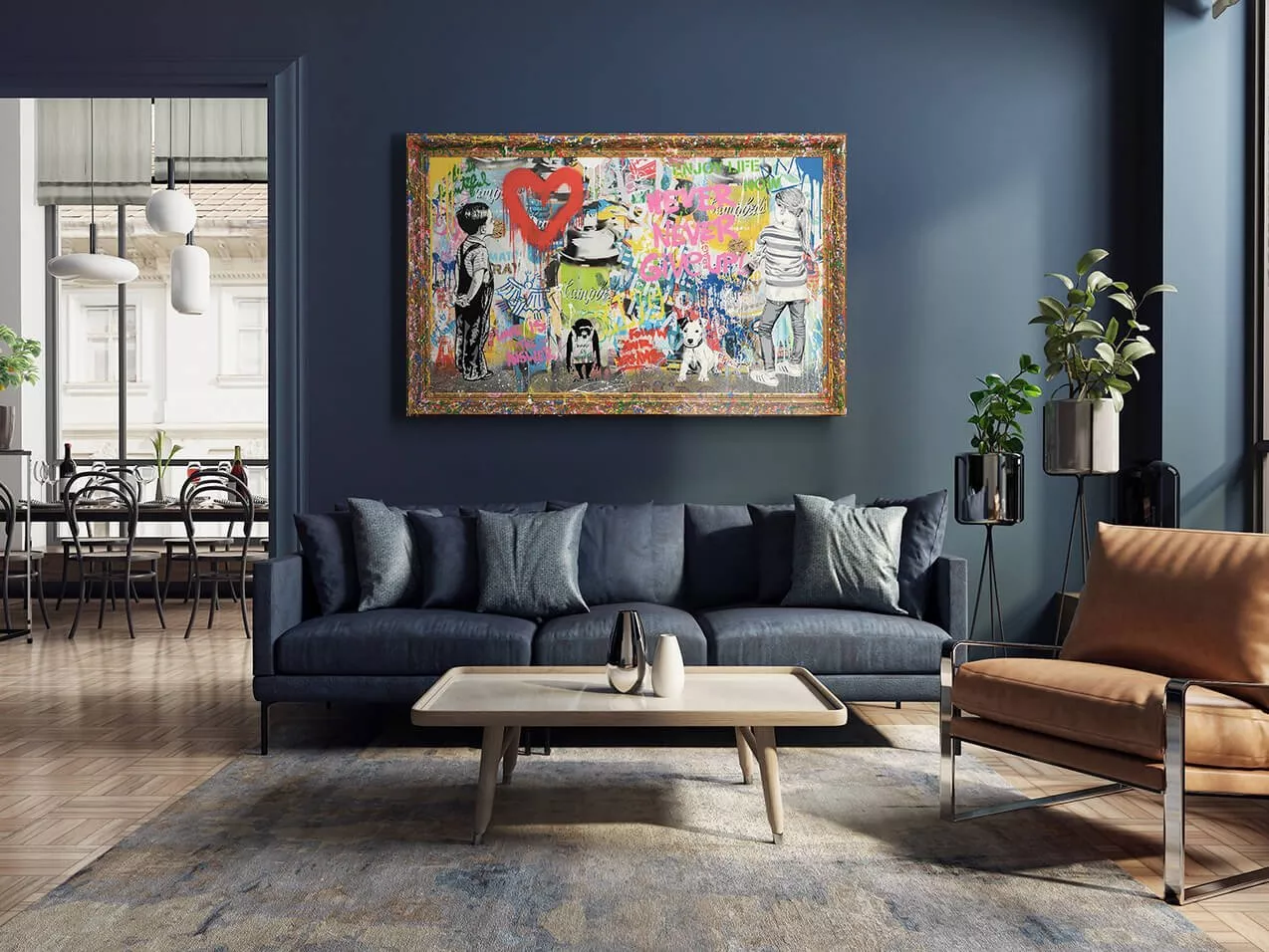 Modern living room with navy blue sofa, framed colourful graffiti wall art, coffee table and indoor plants