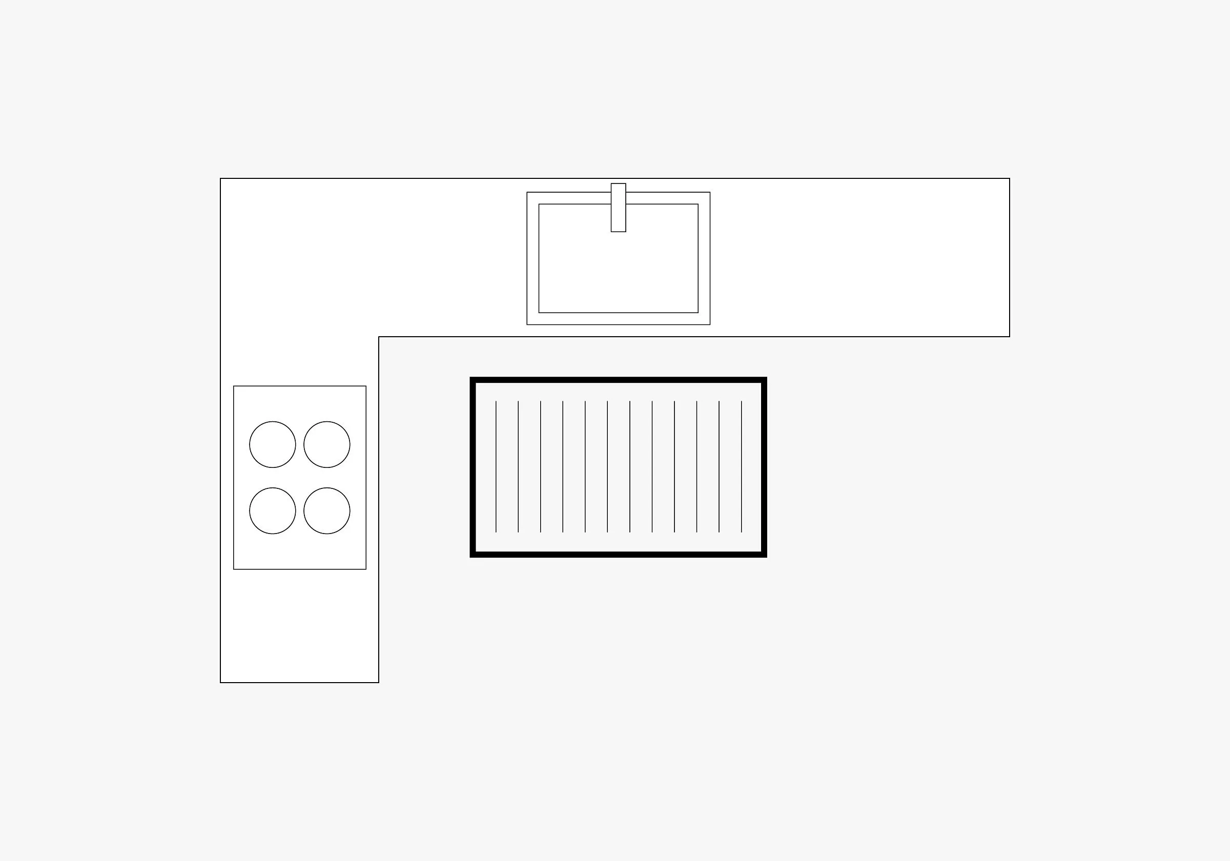 L-shaped kitchen layout with a hob and sink, featuring a rectangular island with seating space.
