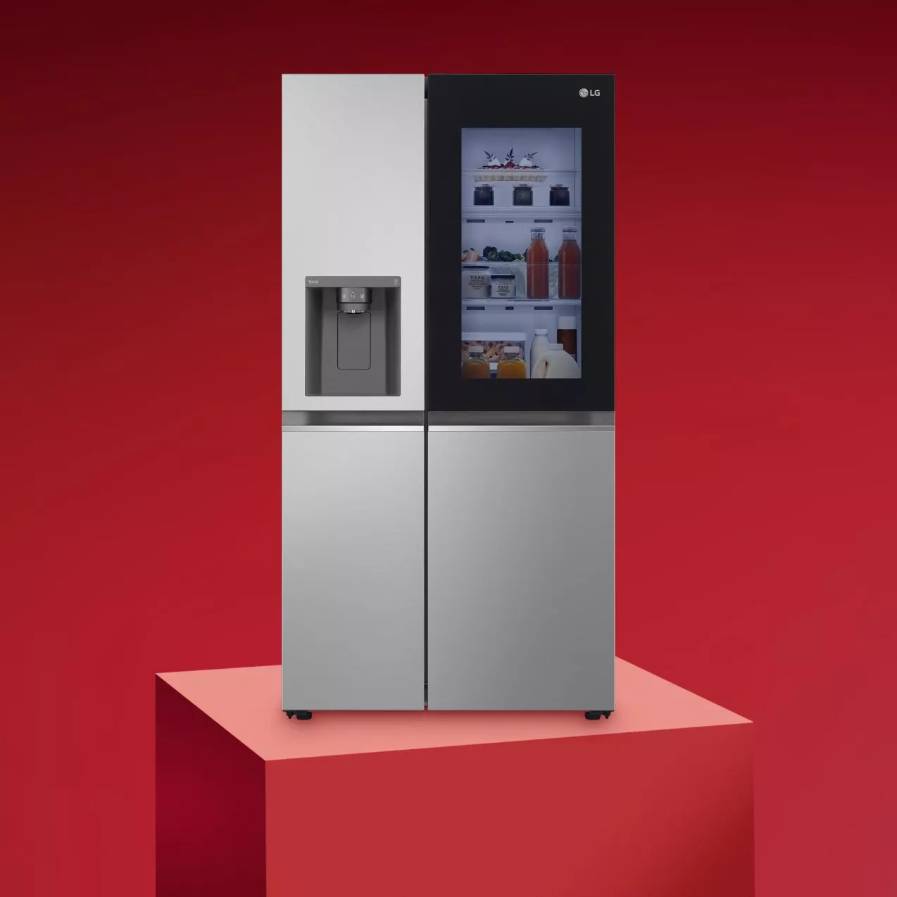 Black washing machine on a red background