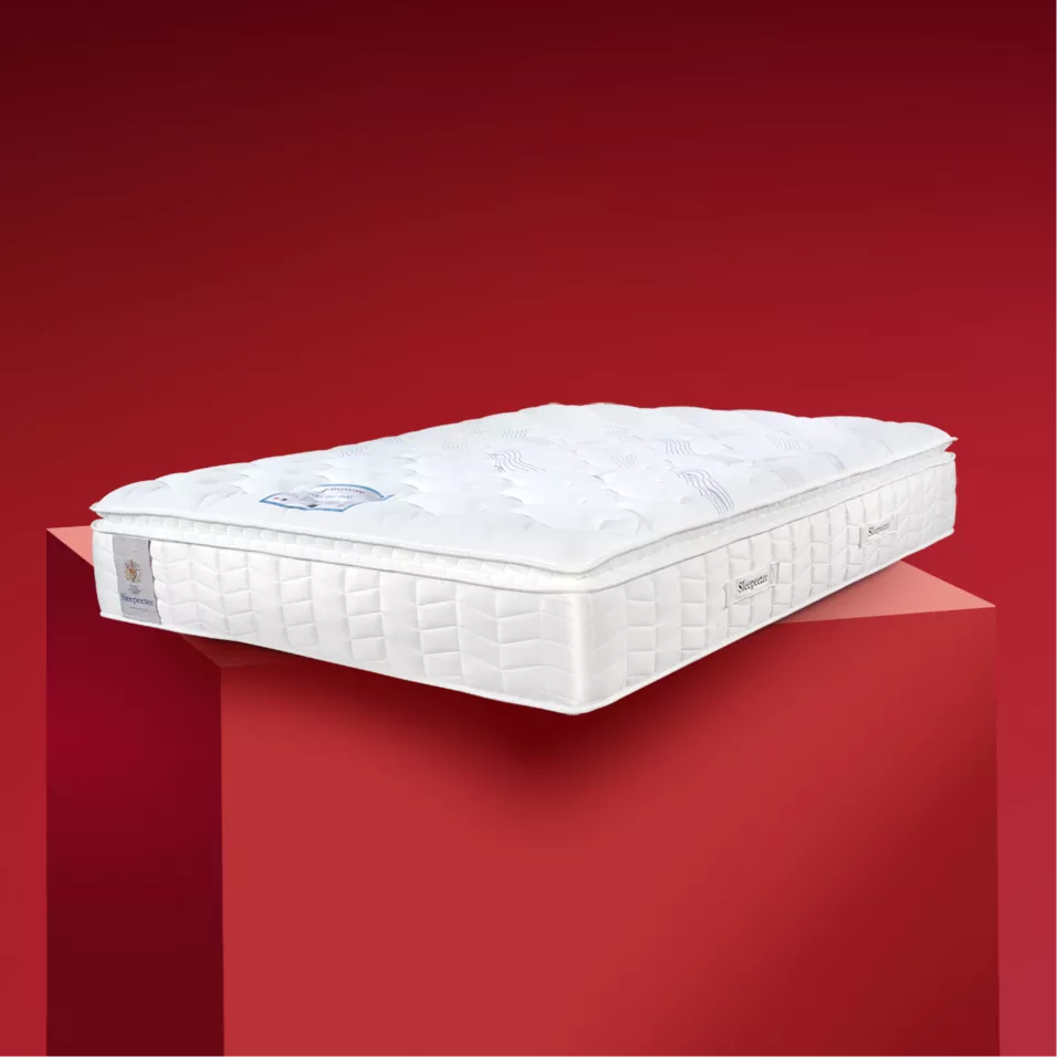 White mattress on a red background