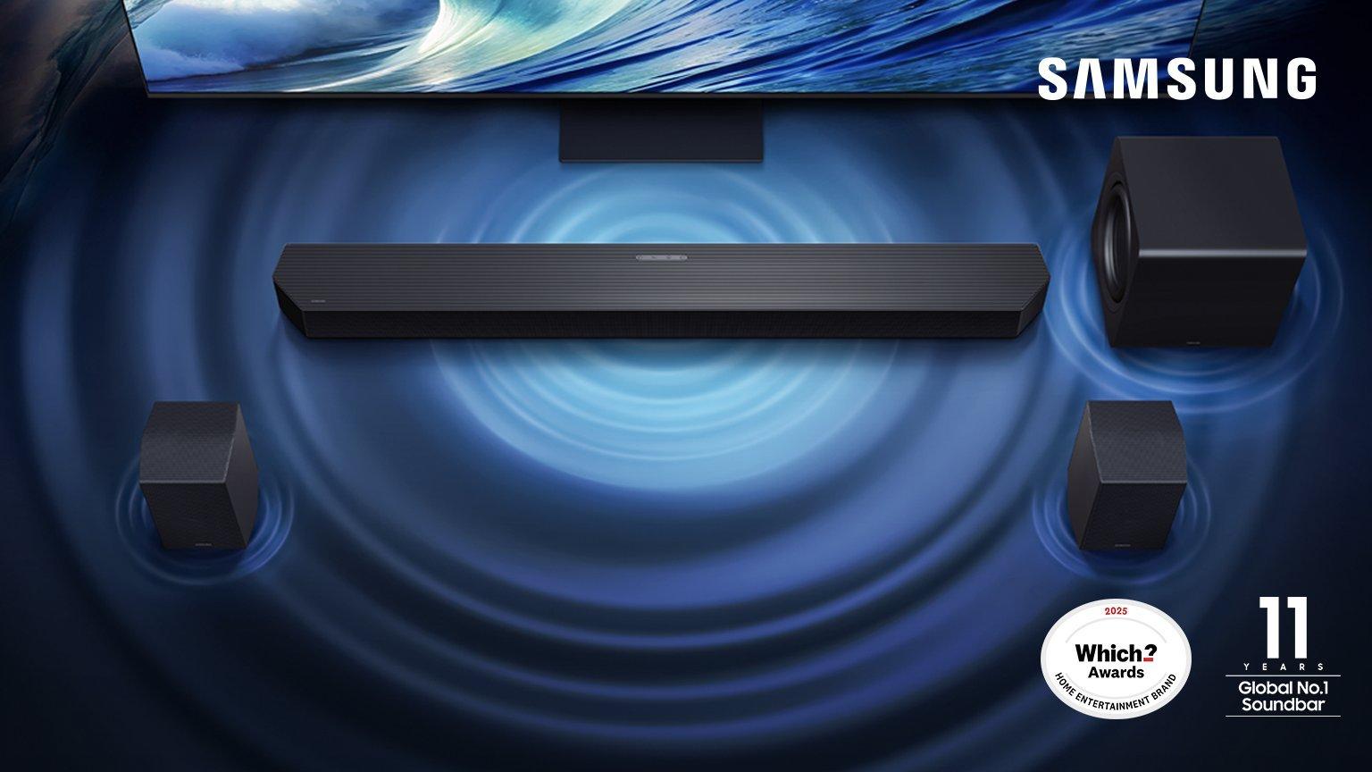 Samsung TV with immersive surround sound system, including a soundbar, subwoofer, and satellite speakers.