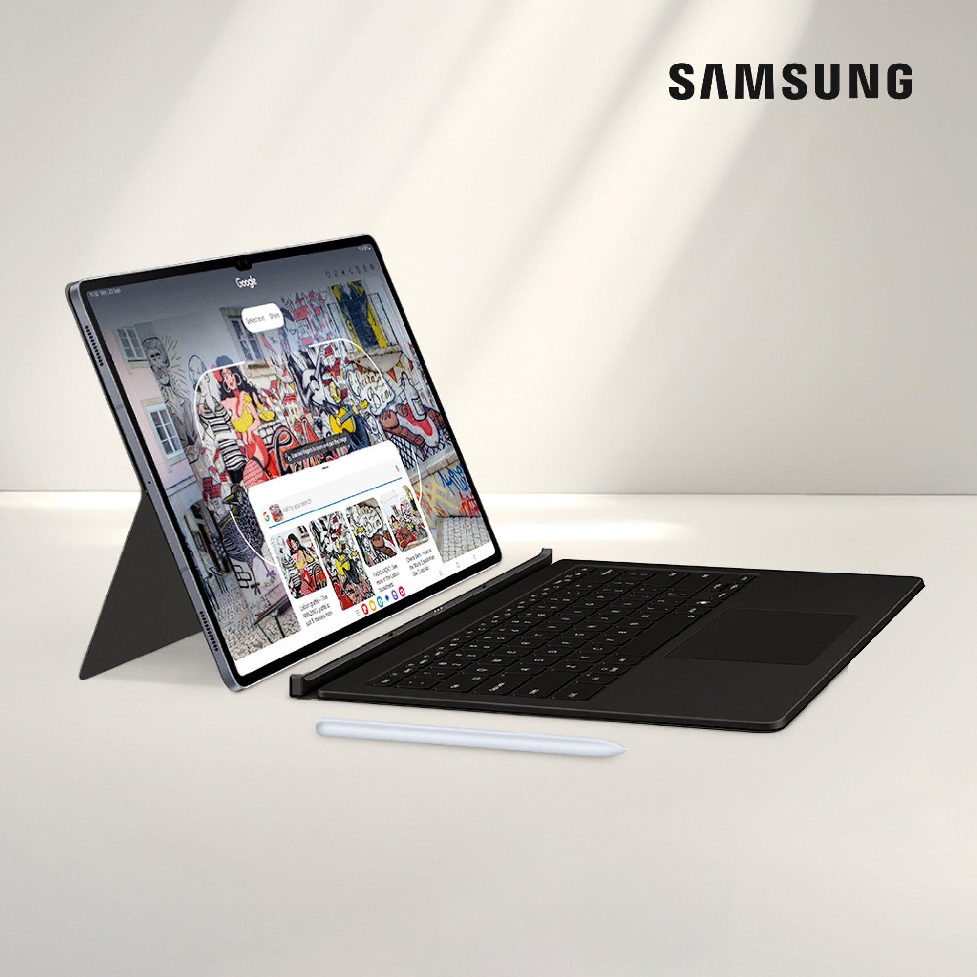 Samsung tablet with detachable keyboard and stylus.