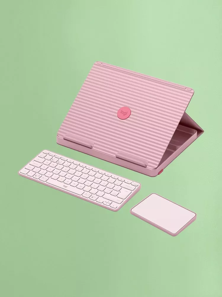 A laptop stand, a keyboard and a mouse pad