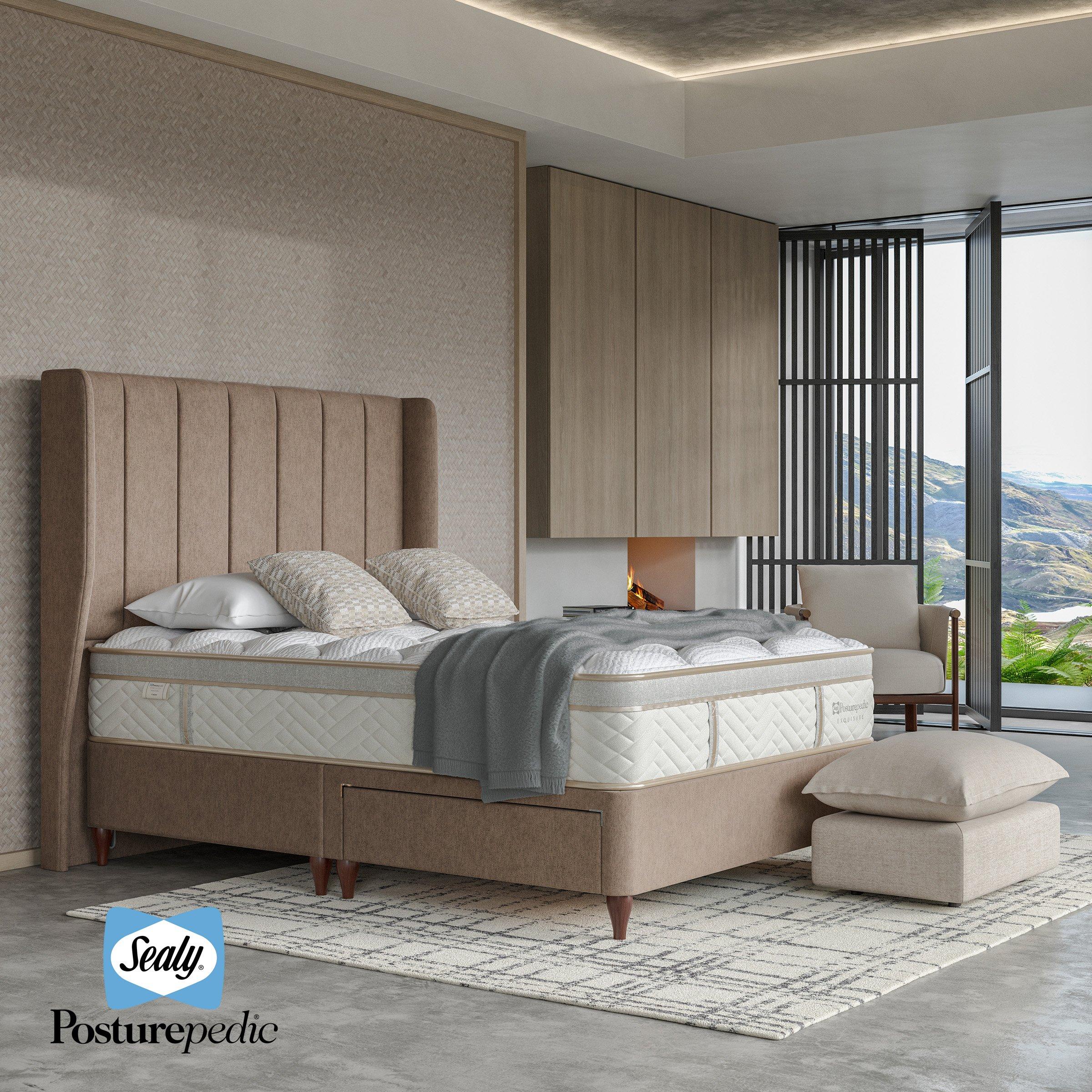 Sealy mattress on bed