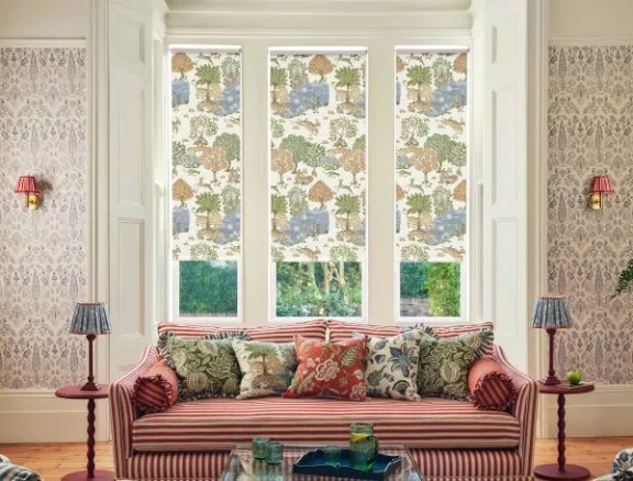 Living room with colourful patterned blinds on the window