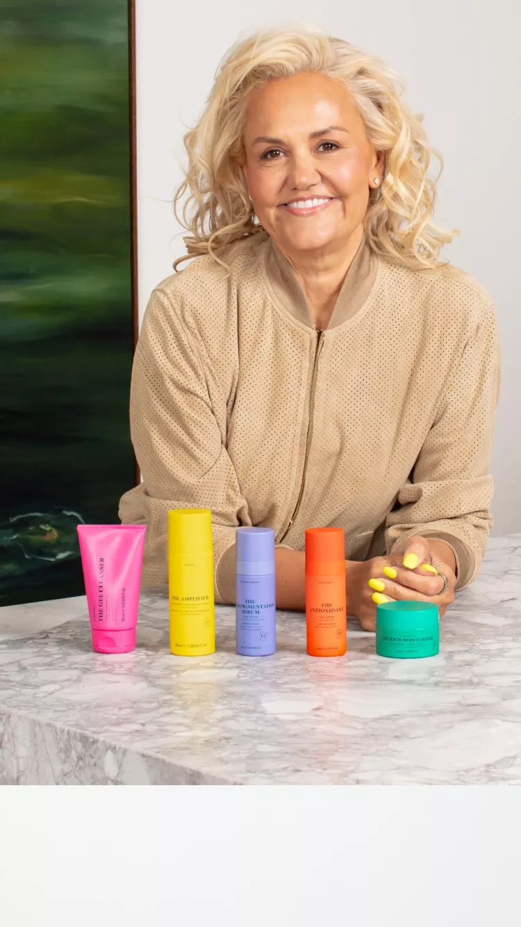 Colourful skincare products arranged on a white background, featuring tubes and jars of various sizes.