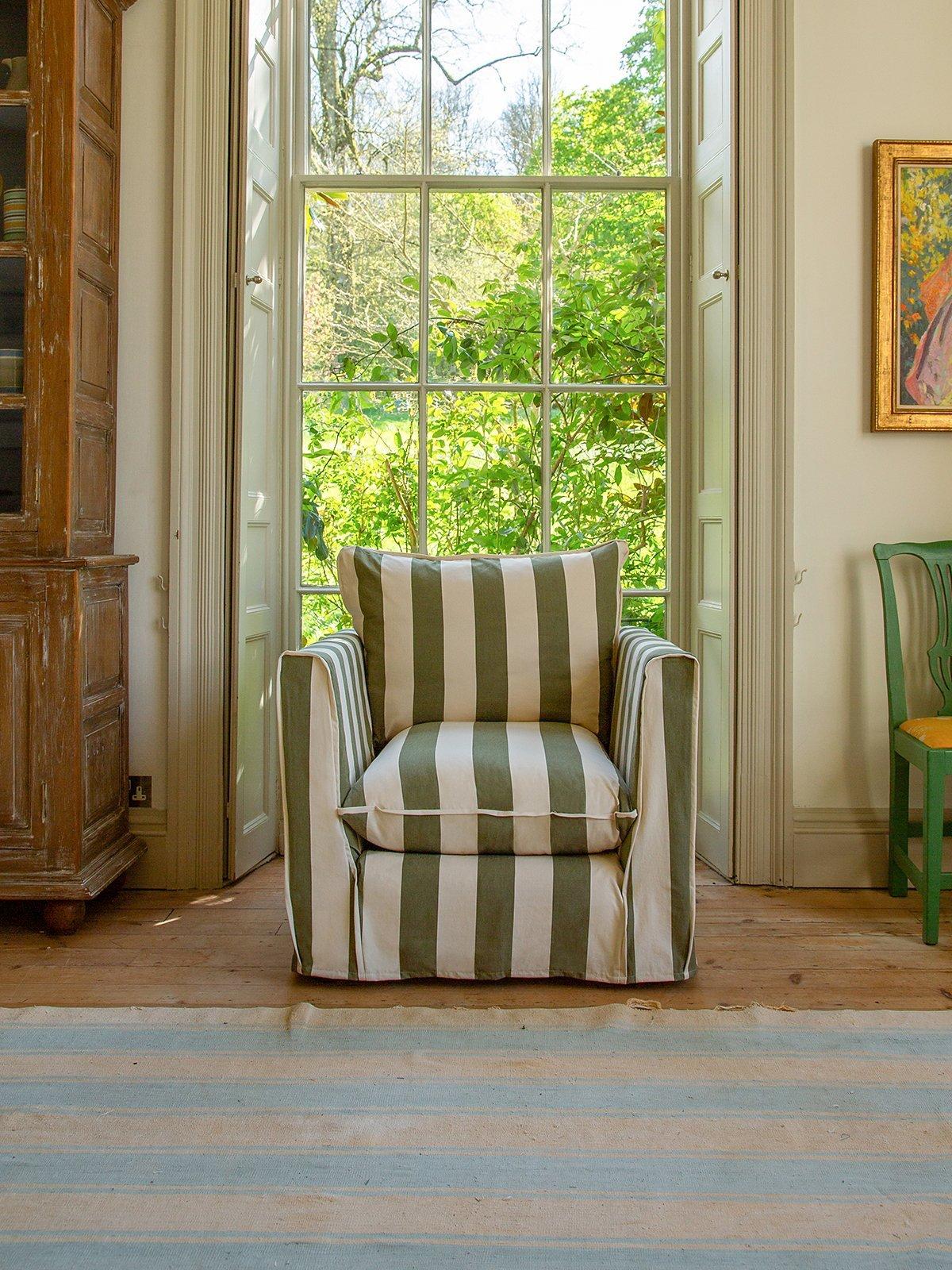 Green and white striped armchair