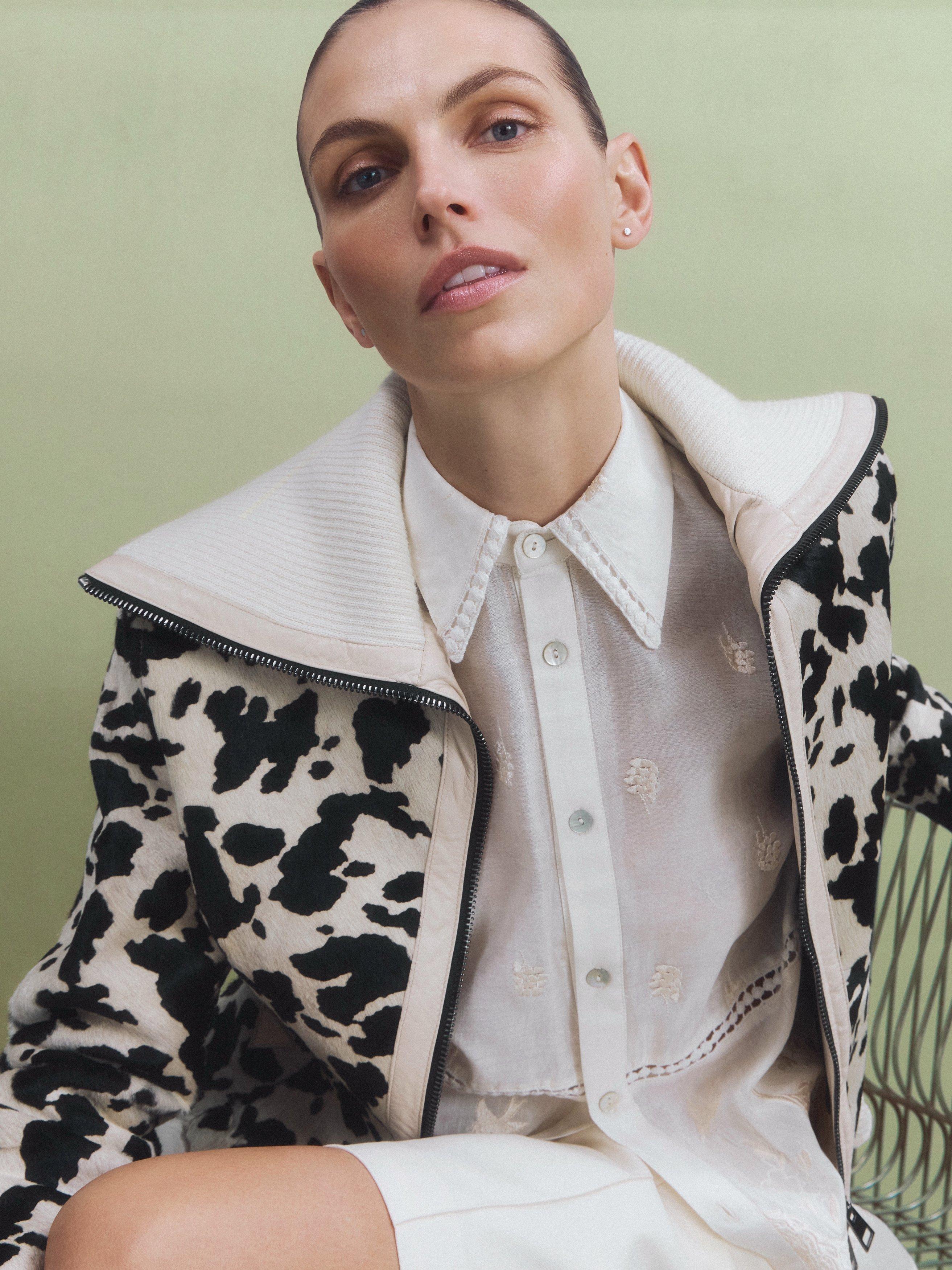 Image of a female model close up wearing SS daley