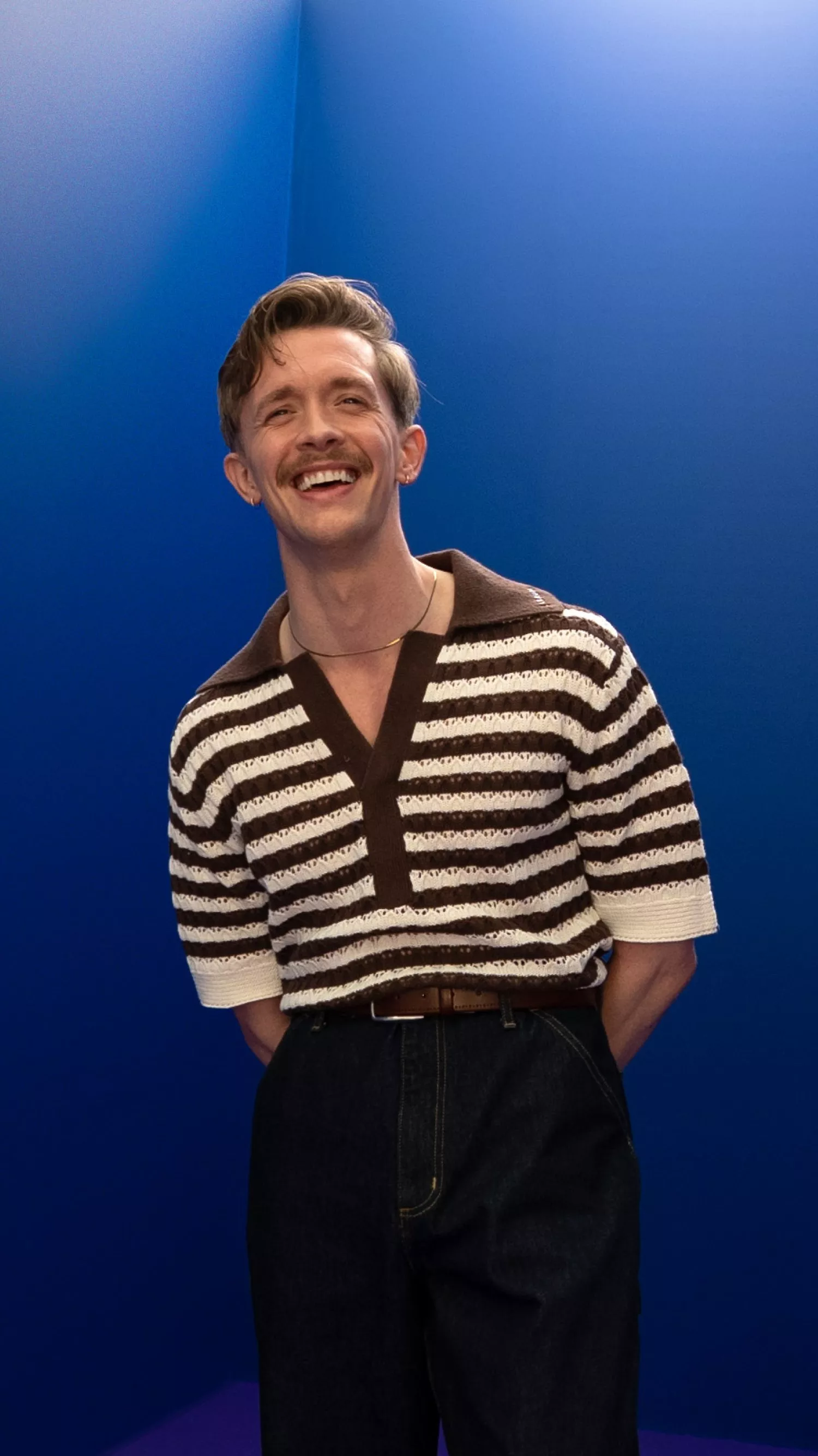 Promotional poster for John Lewis Presents To: Me, From: Me with Stephen Libby, smiling on blue backdrop