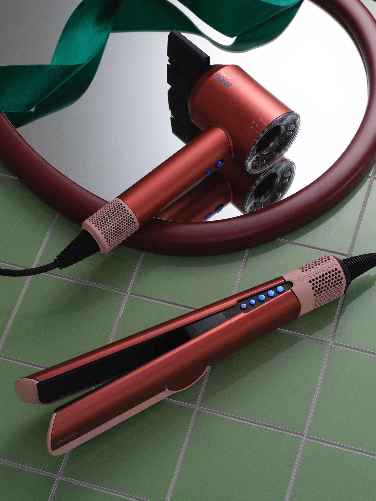 Image of some straigteners and hairdryer on the bathroom side