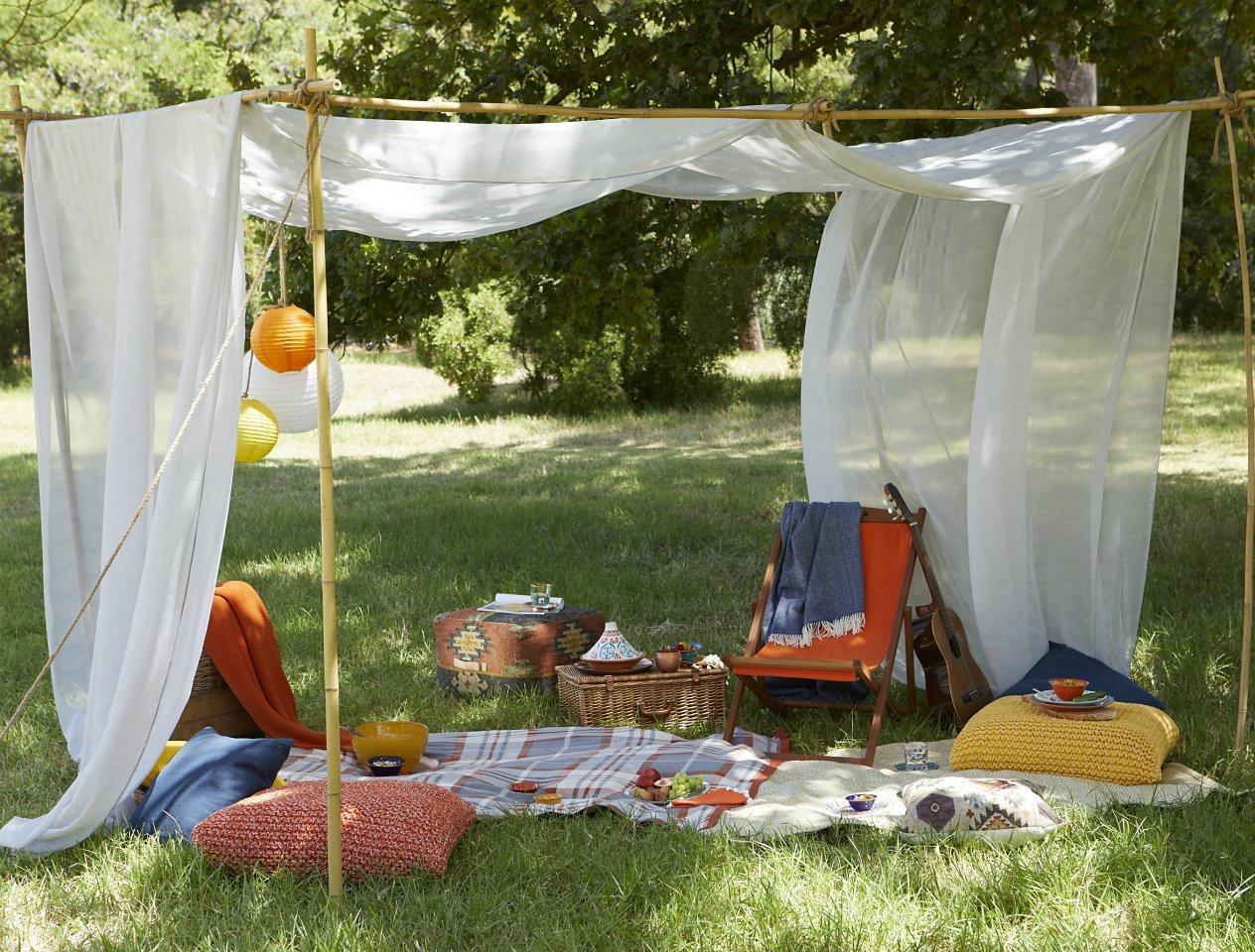 Summer picnic under the shade of an overhanging tree