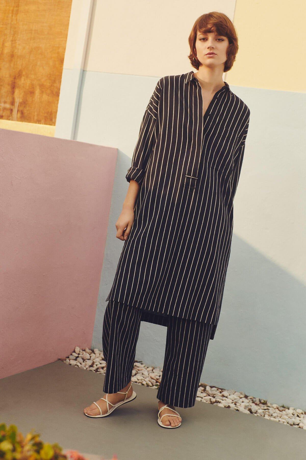 Kin dress and trousers