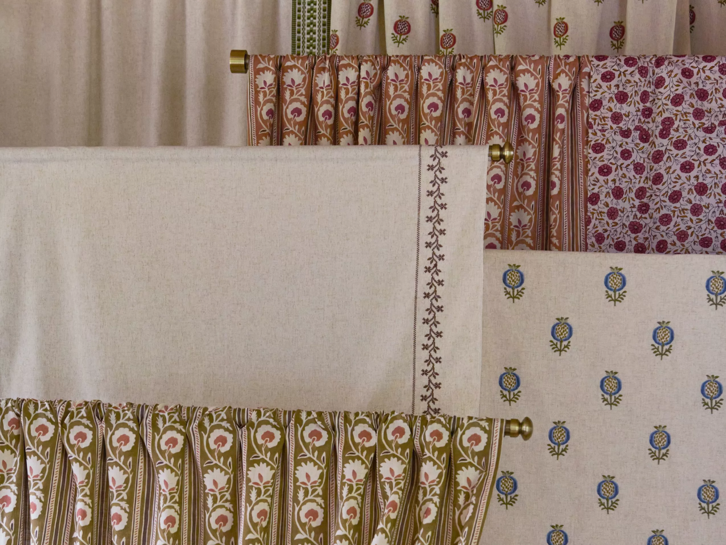 different timeless curtain patterns layered on top of one another