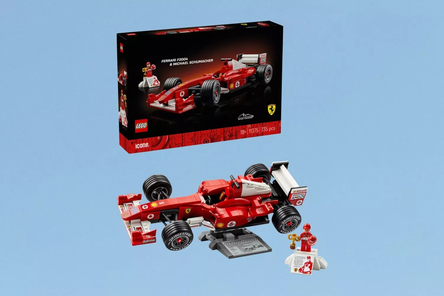 LEGO Icons Ferrari F2004 F1 car set with box, display stand and minifigure on a light blue background