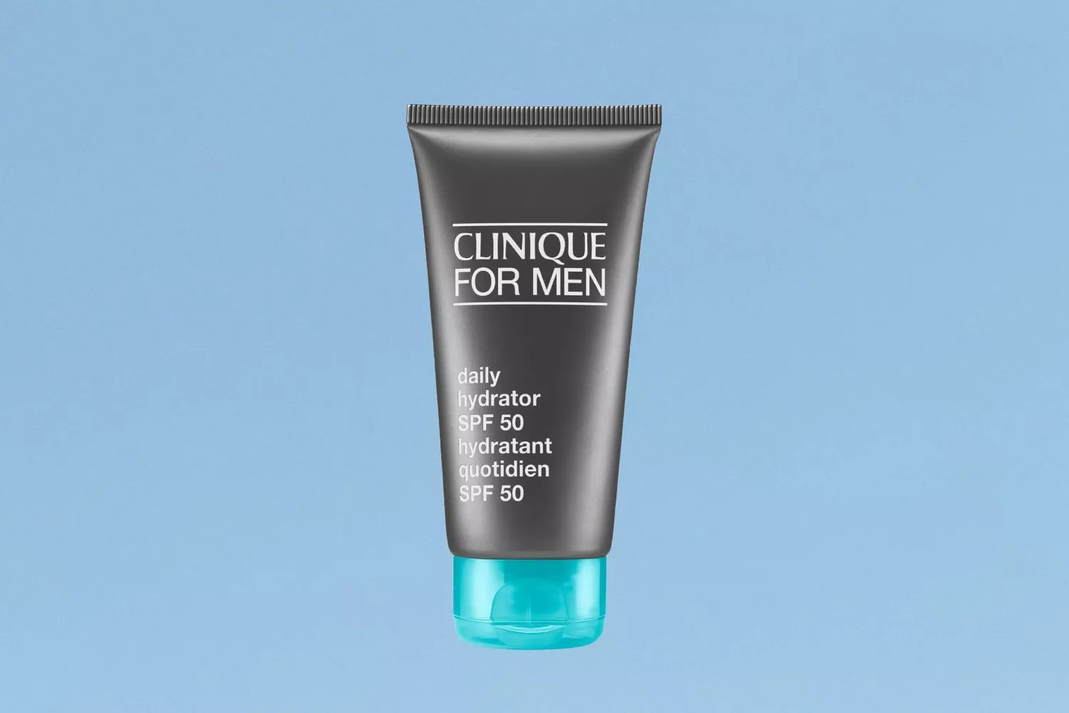 Clinique For Men Daily Hydrator SPF 50 moisturiser tube with blue cap on light blue background