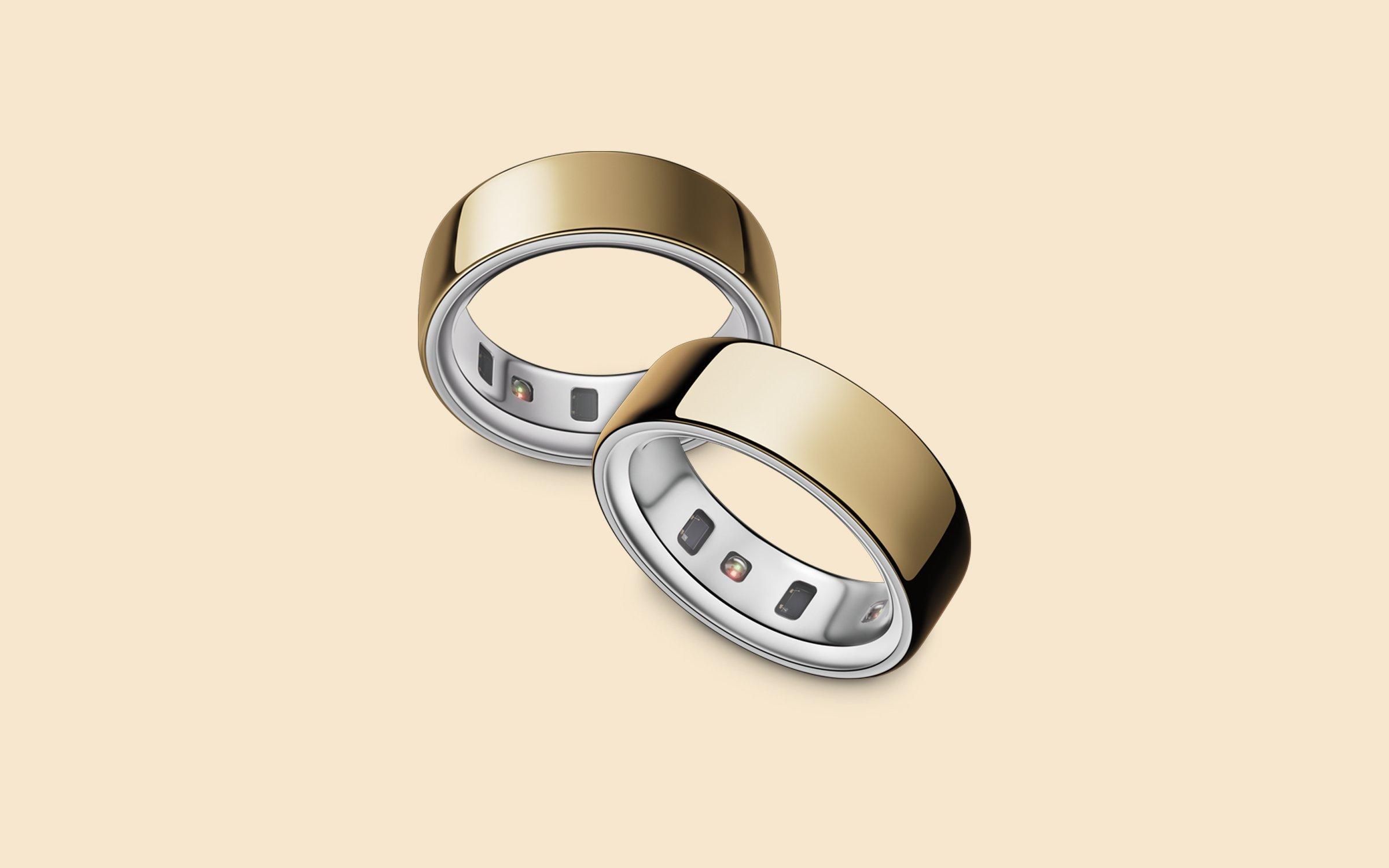 Image of a silver Oura ring on a mirror background