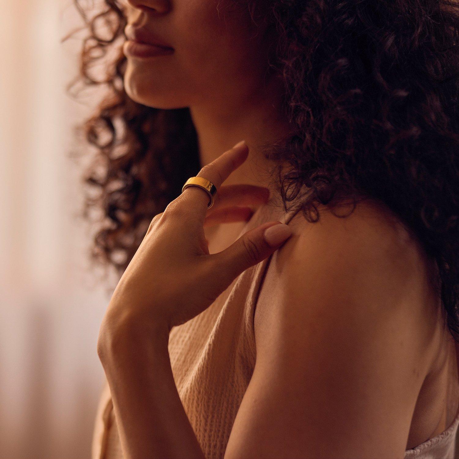 Image of a lady wearing an Oura ring