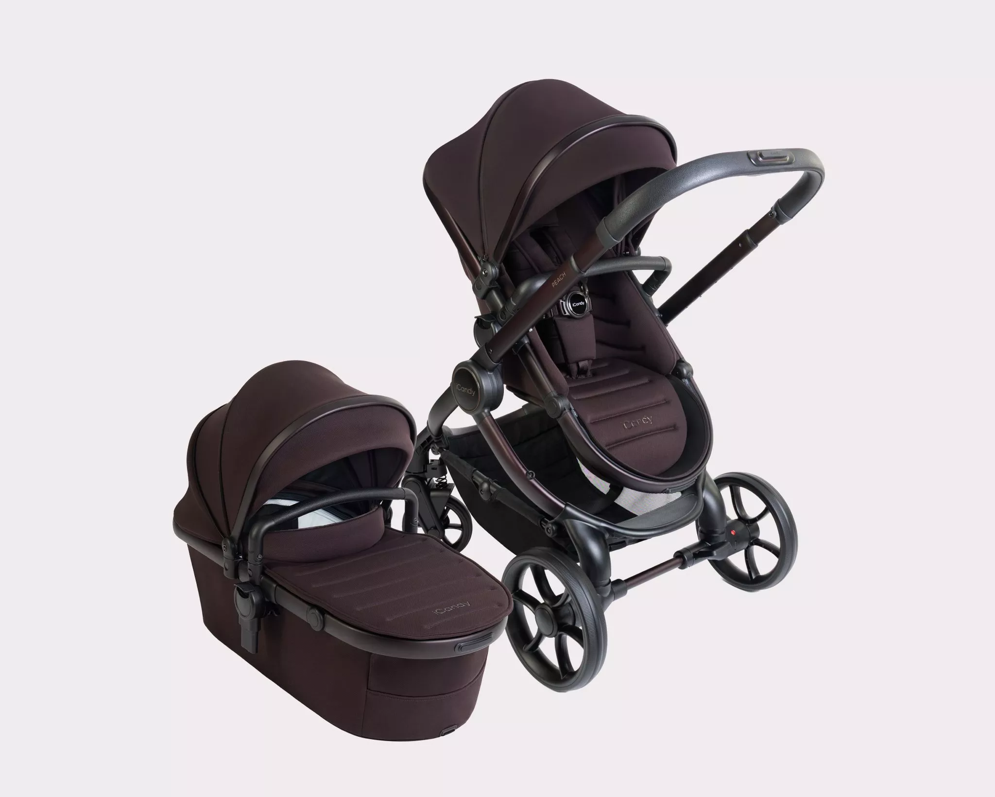 iCandy Peach pushchair and carrycot travel system in dark brown with canopy, large wheels and adjustable handlebar