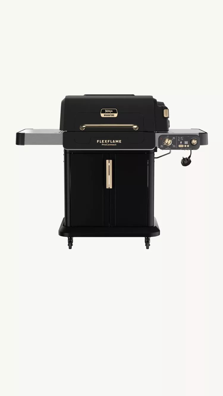 cut out of a Ninja FlexFlame Pro Connect Outdoor Cooking System on a background