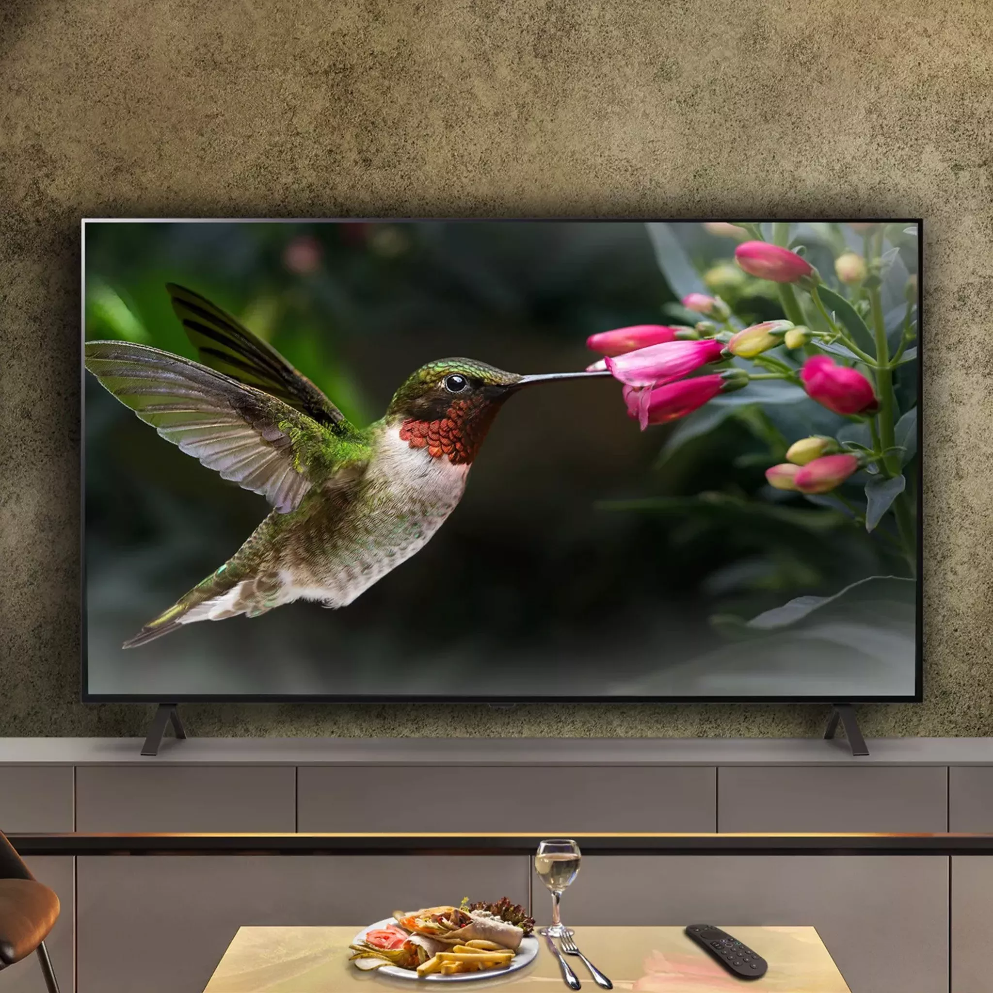 TV with bird and flower photo on the screen
