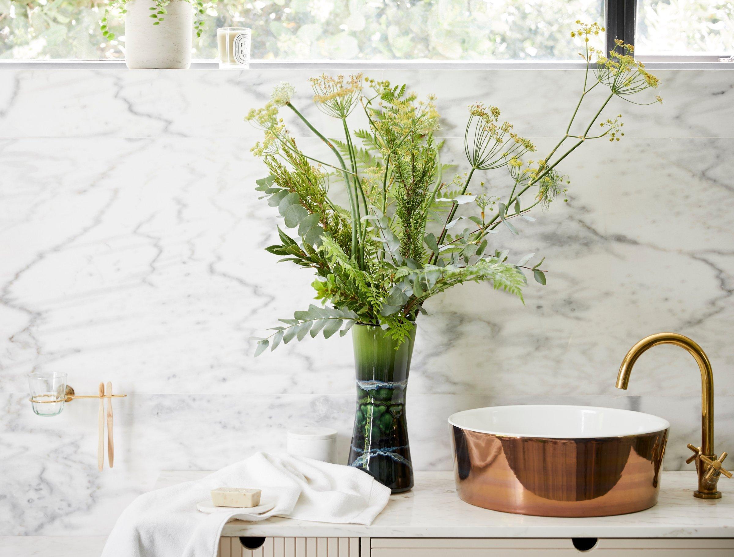 Vases lead image, green vase next to bathroom sink