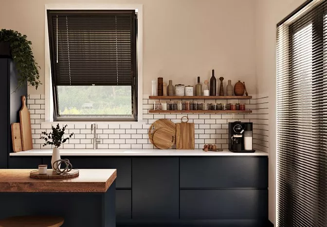 Kitchen with black blinds on the window