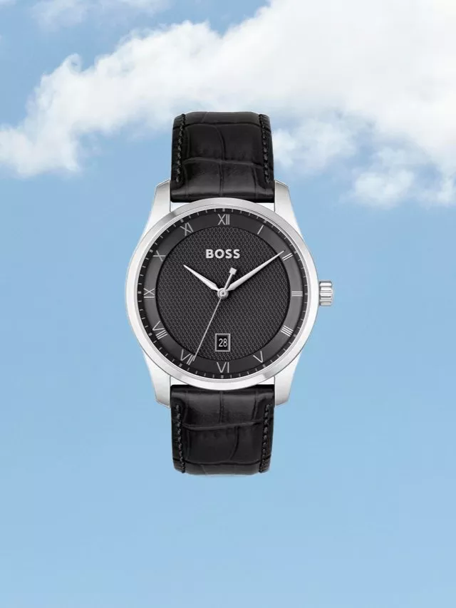 BOSS men's analogue wristwatch with black leather strap, silver case, black dial and date window on blue sky background
