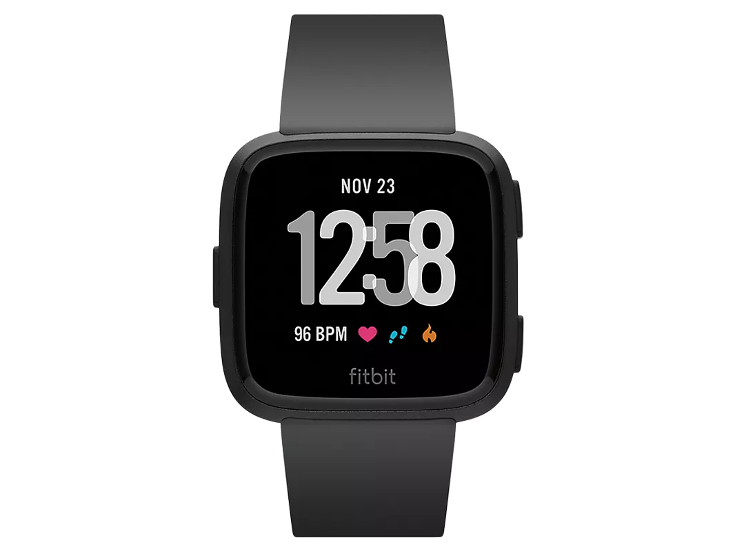 Fitbit Versa smartwatch with black strap showing 12:58 time, date Nov 23 and heart rate 96 BPM on screen