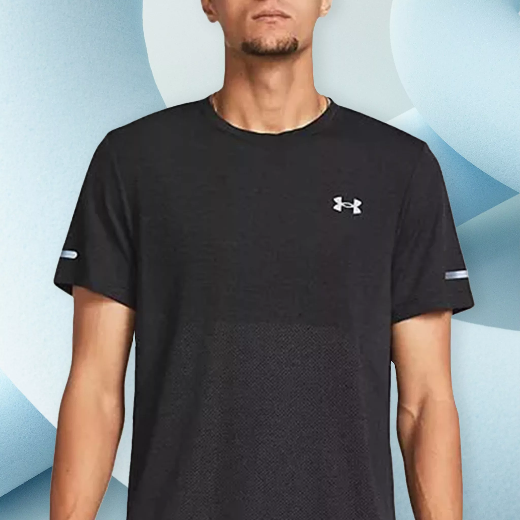 man wearing black sports top under armour