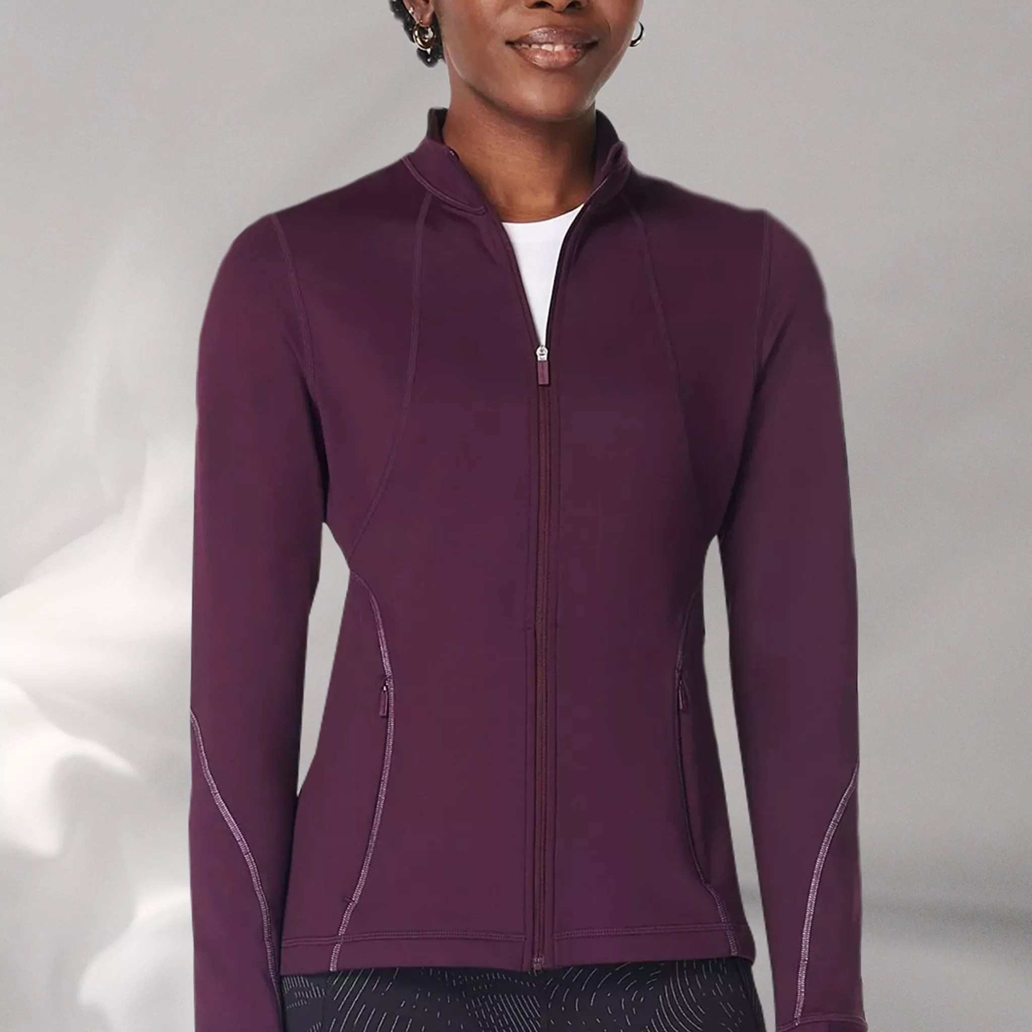 womens wearing a purple sports top