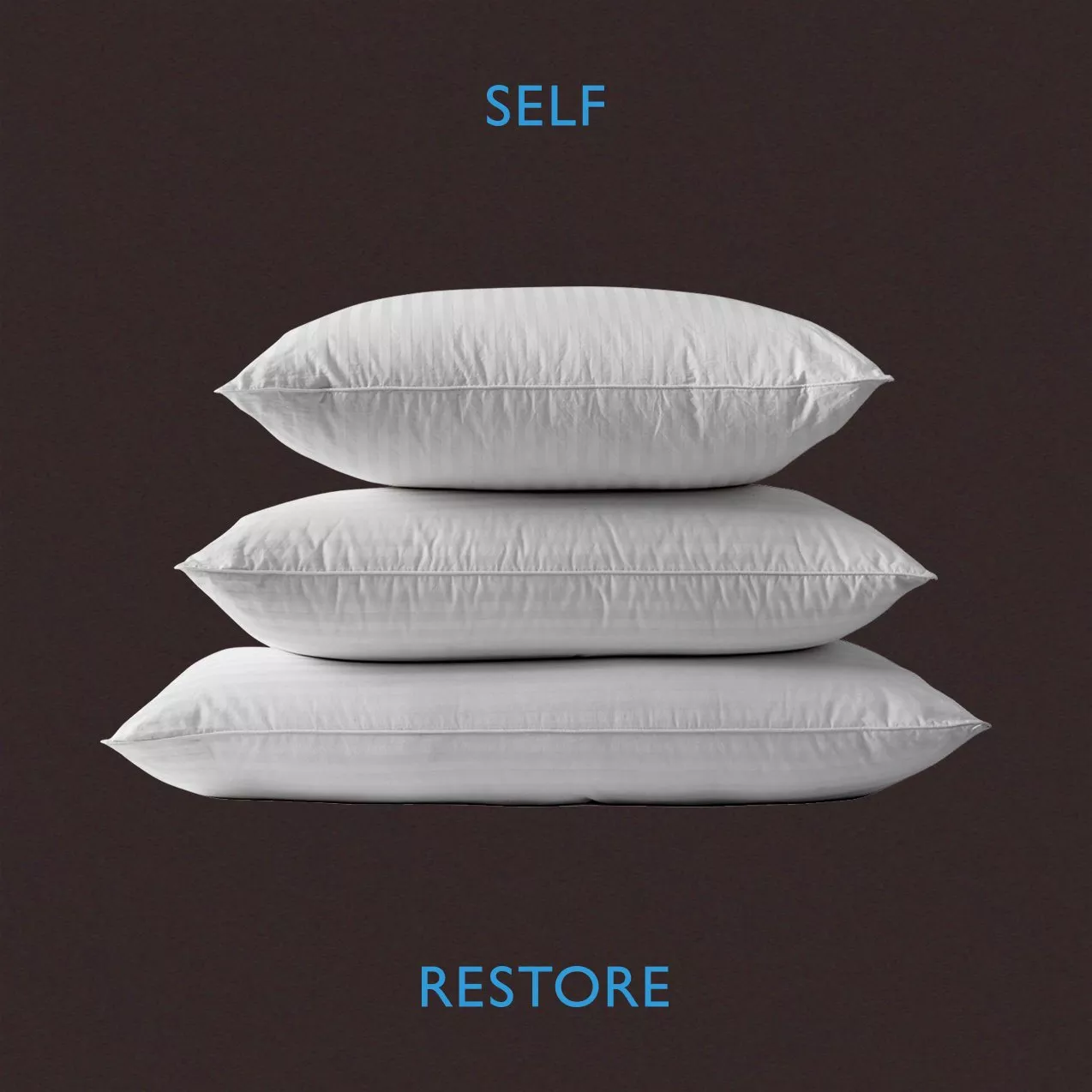 A vertical stack of three plush white bed pillows centered on a dark brown background. The text "SELF" is written above and "RESTORE" is written below in blue.
