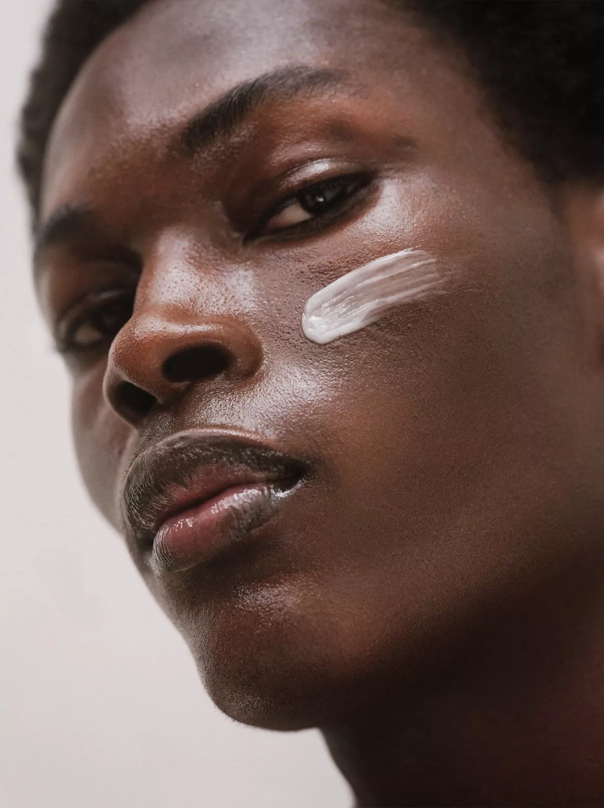 man wearing skincare products 