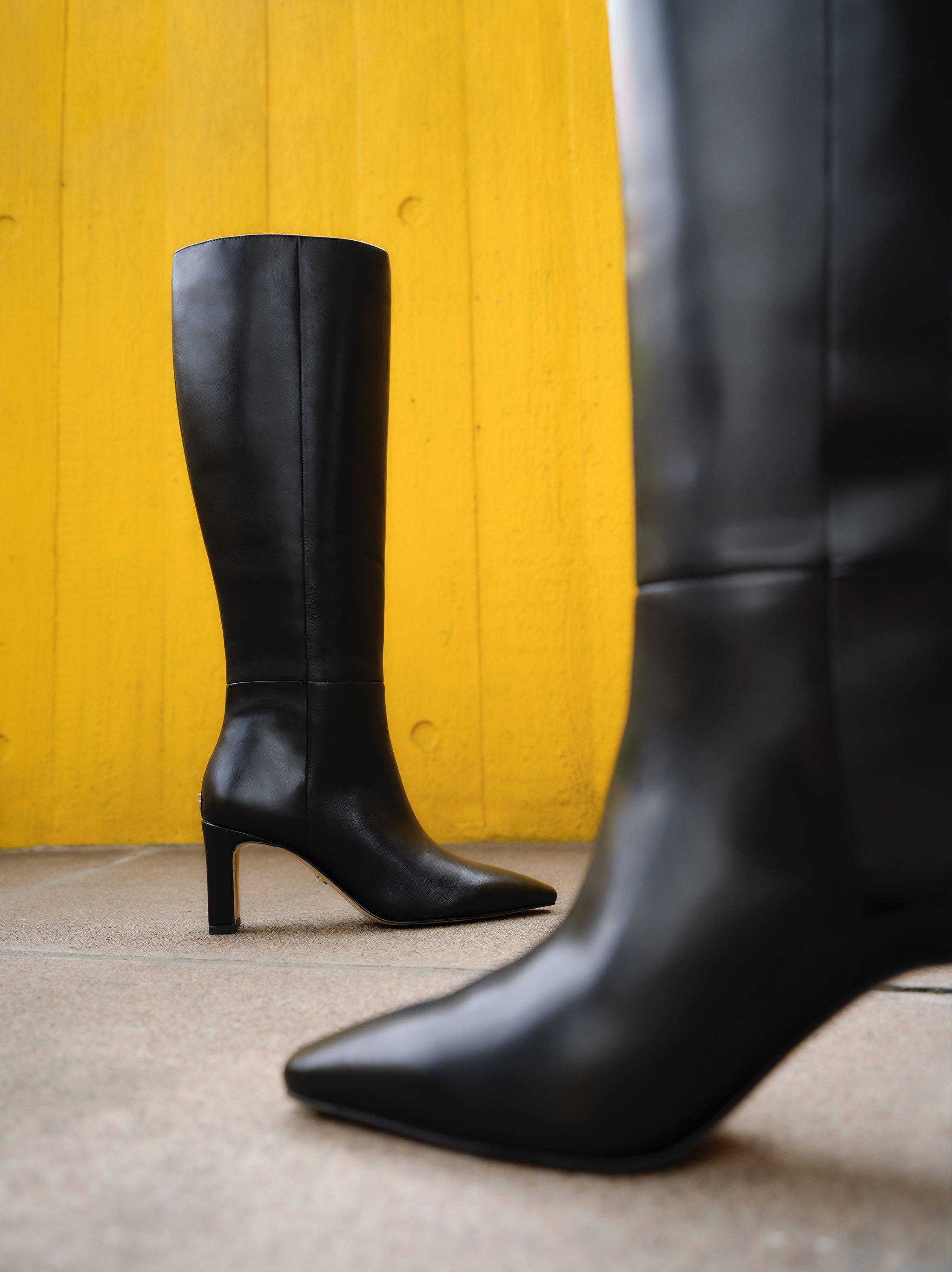 Long black high heel boots