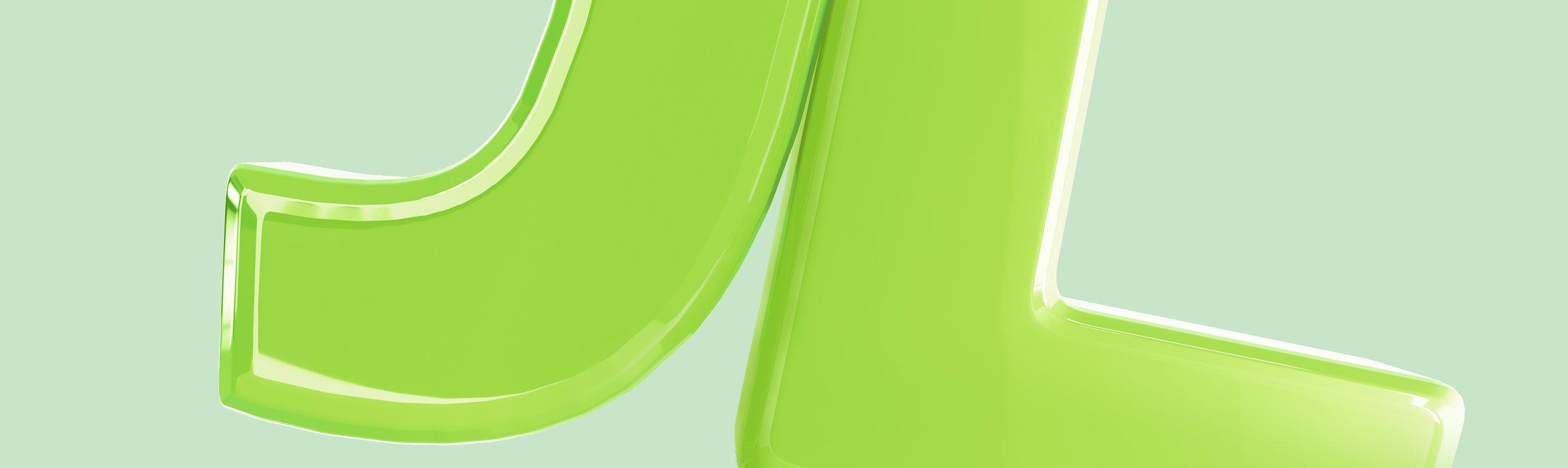 Outdoor summer dining plates, glasses and bowls on a green garden table