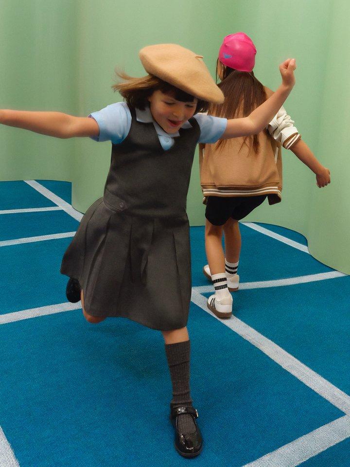 Two girls in school uniforms