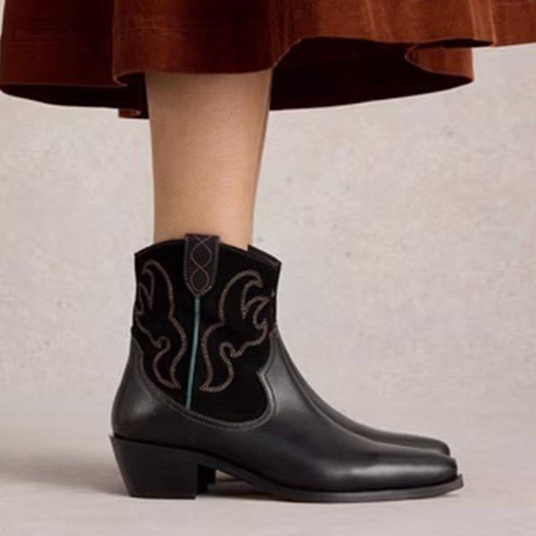 A women wearing Cowboy Boots with red skirts