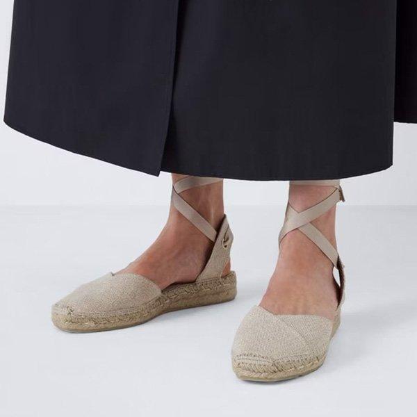 Espadrille flats with ankle ties.