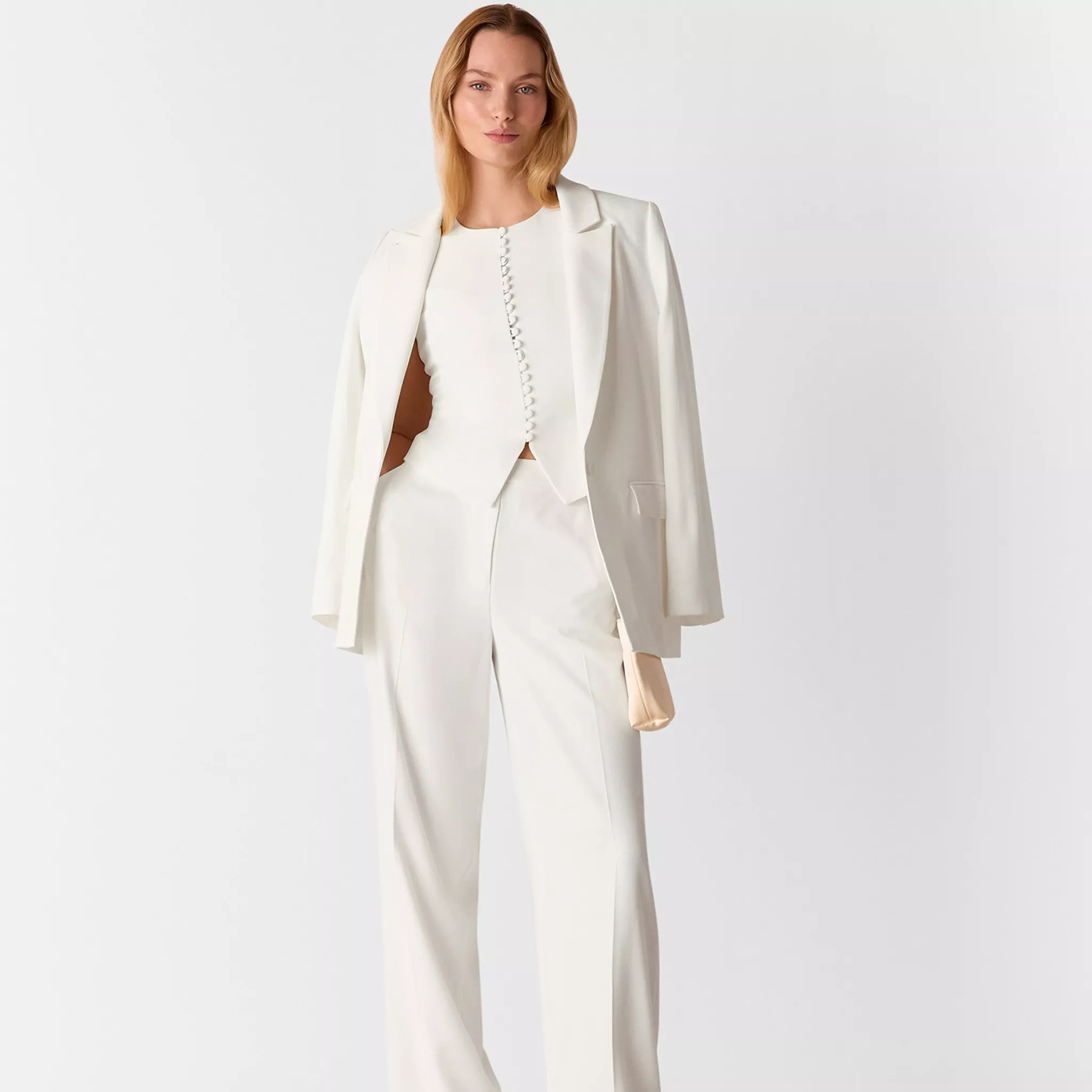 woman in white suit