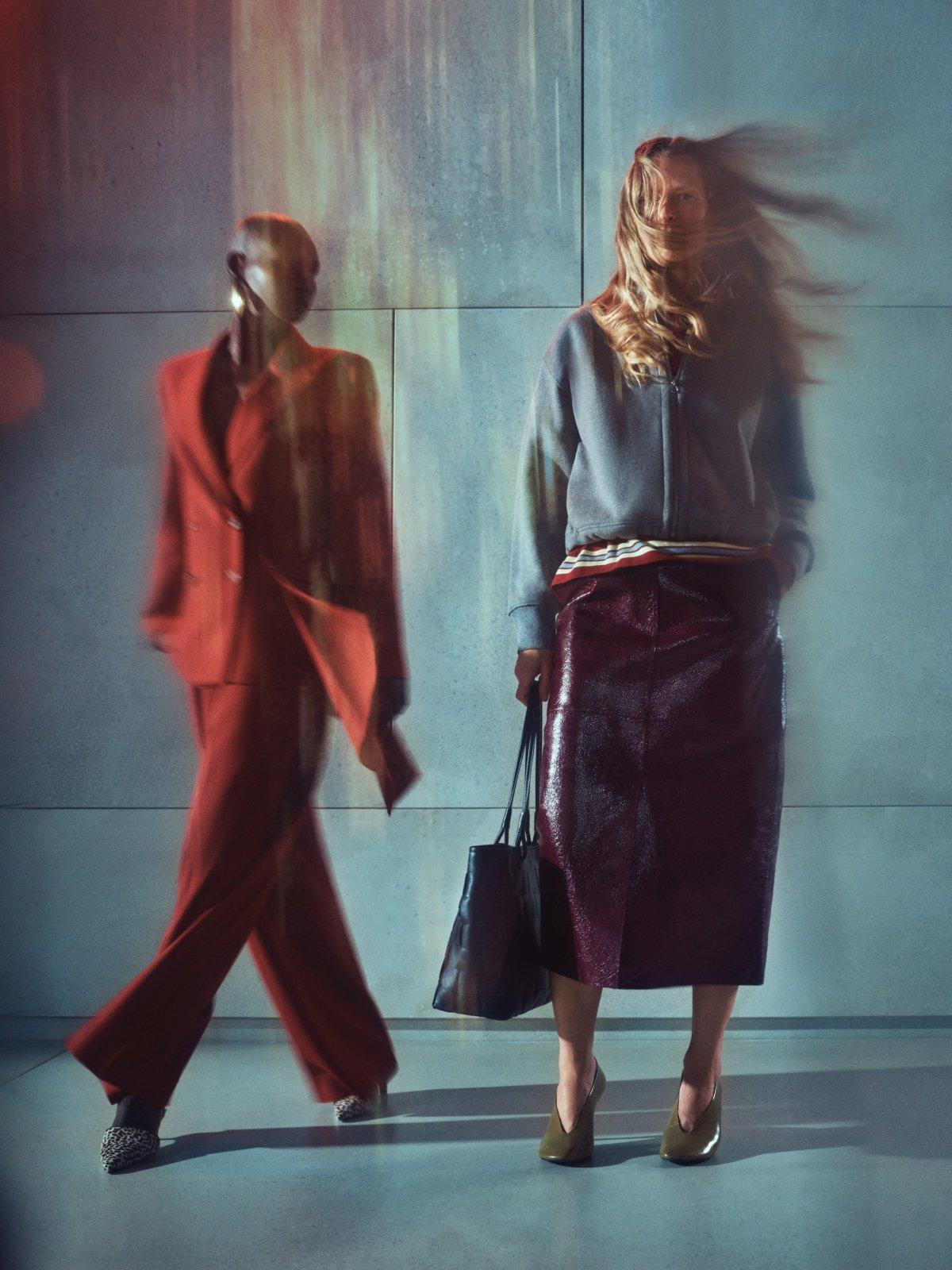 shot of 2 blurry on the go women dressed in work wear