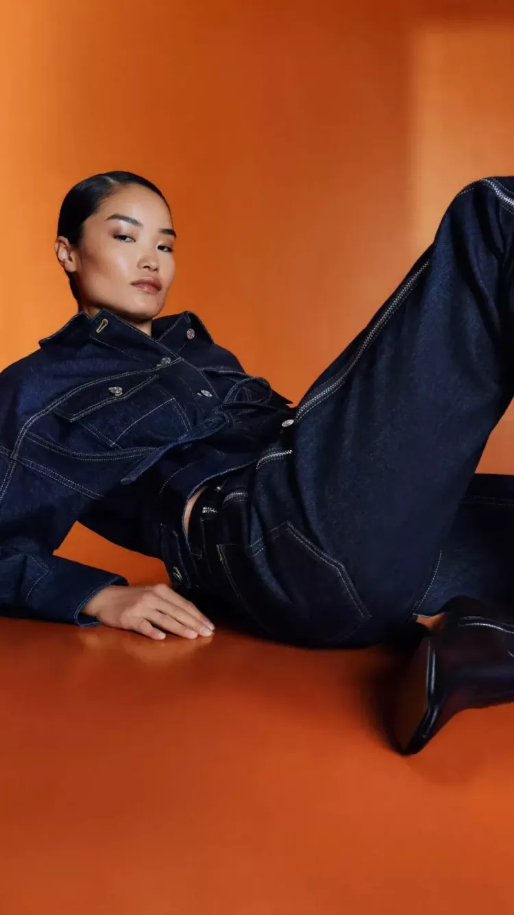 women wearing phillip lim clothes, in a orange box room