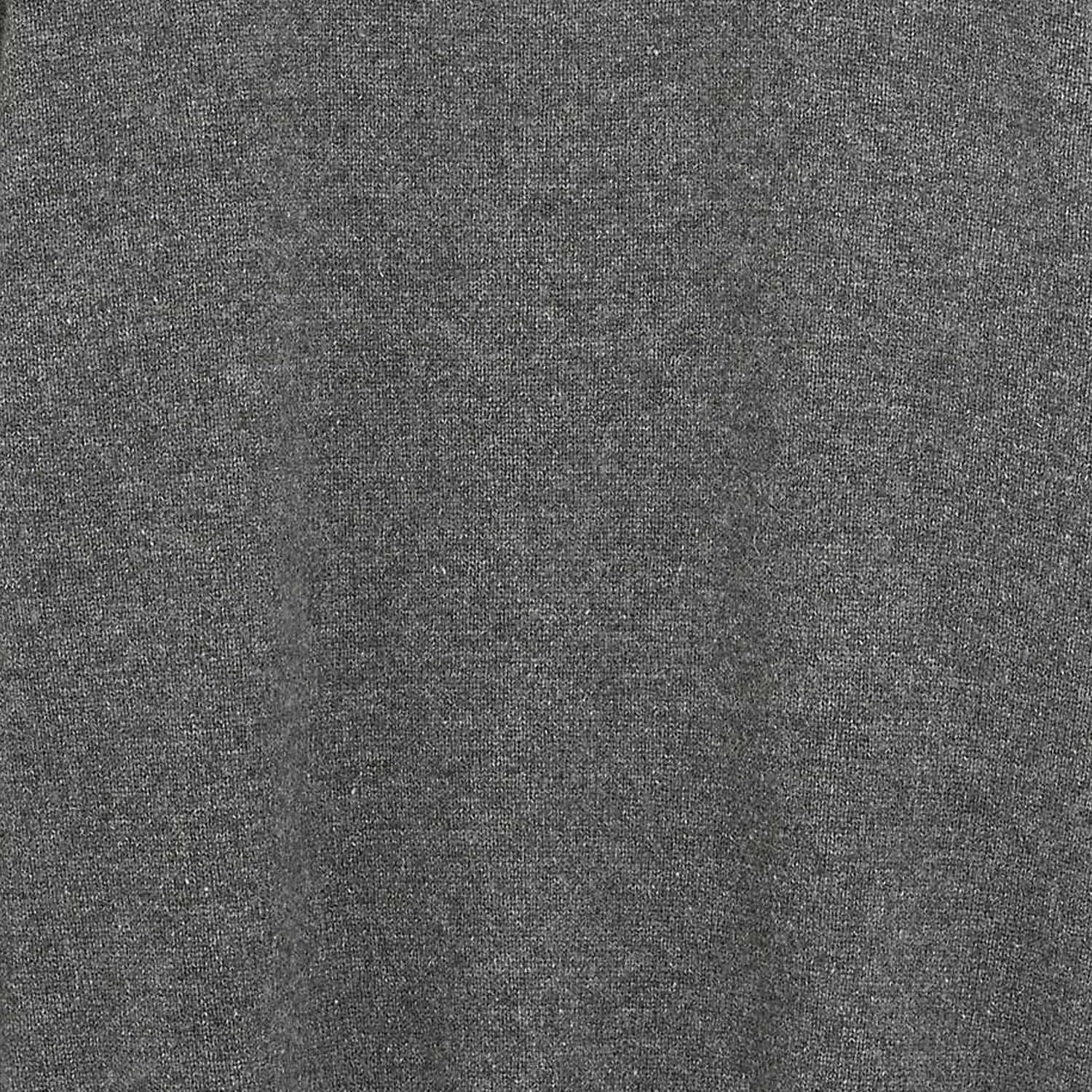 Close-up of dark grey textured fabric background, soft heather knit material for upholstery or clothing