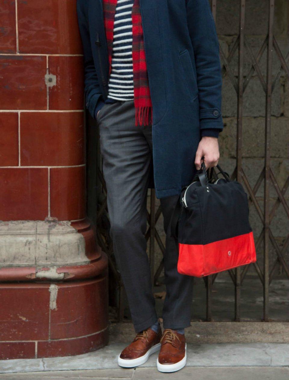 Man wearing blue and white striped jumper