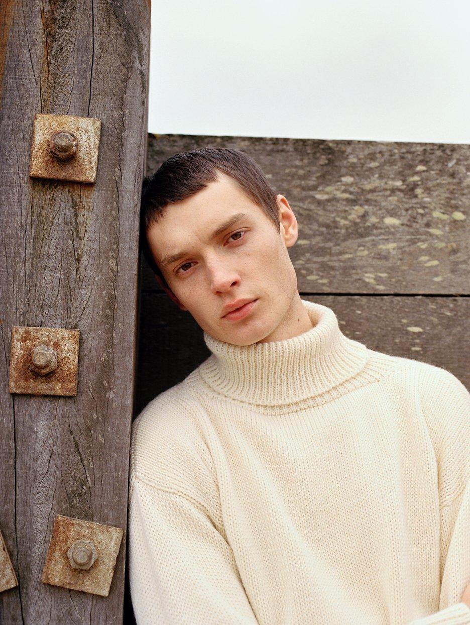 Model in a cream jumper