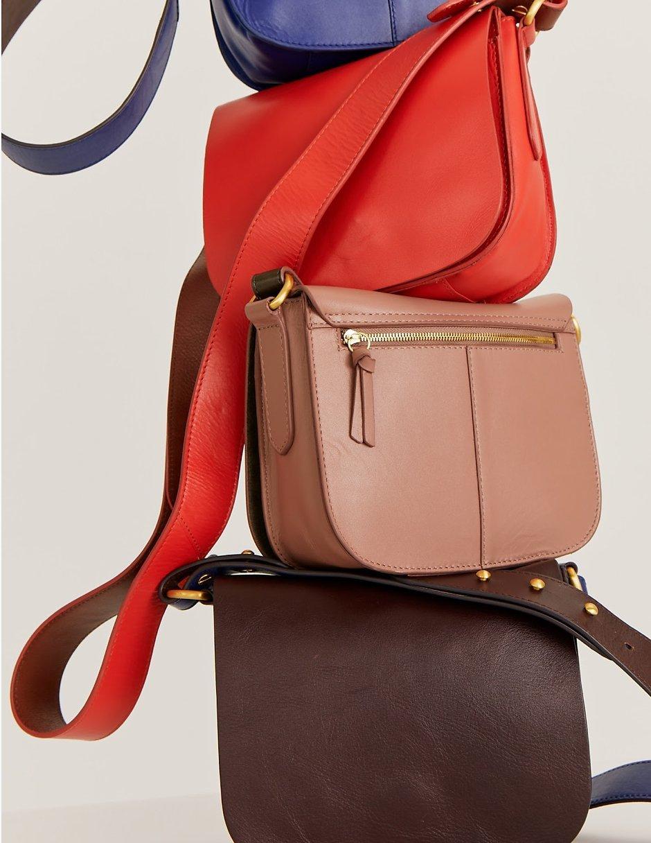 Stack of leather handbags